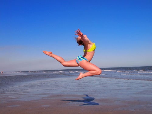 ocean jumping beach activities spinnaker resorts blog